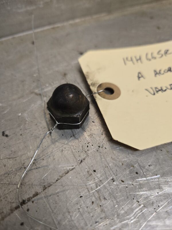 A VALVE COVER ACORN NUT